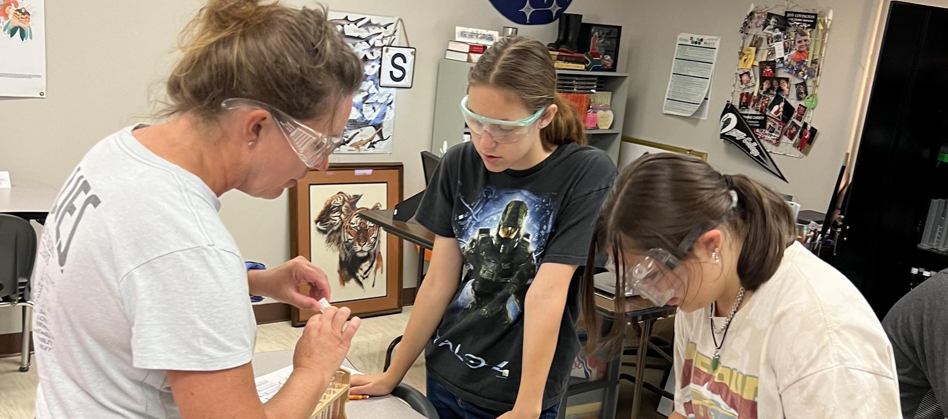Students working on a lab in biology.