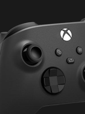 A closeup of the buttons of a black XBOX Wireless Controller.