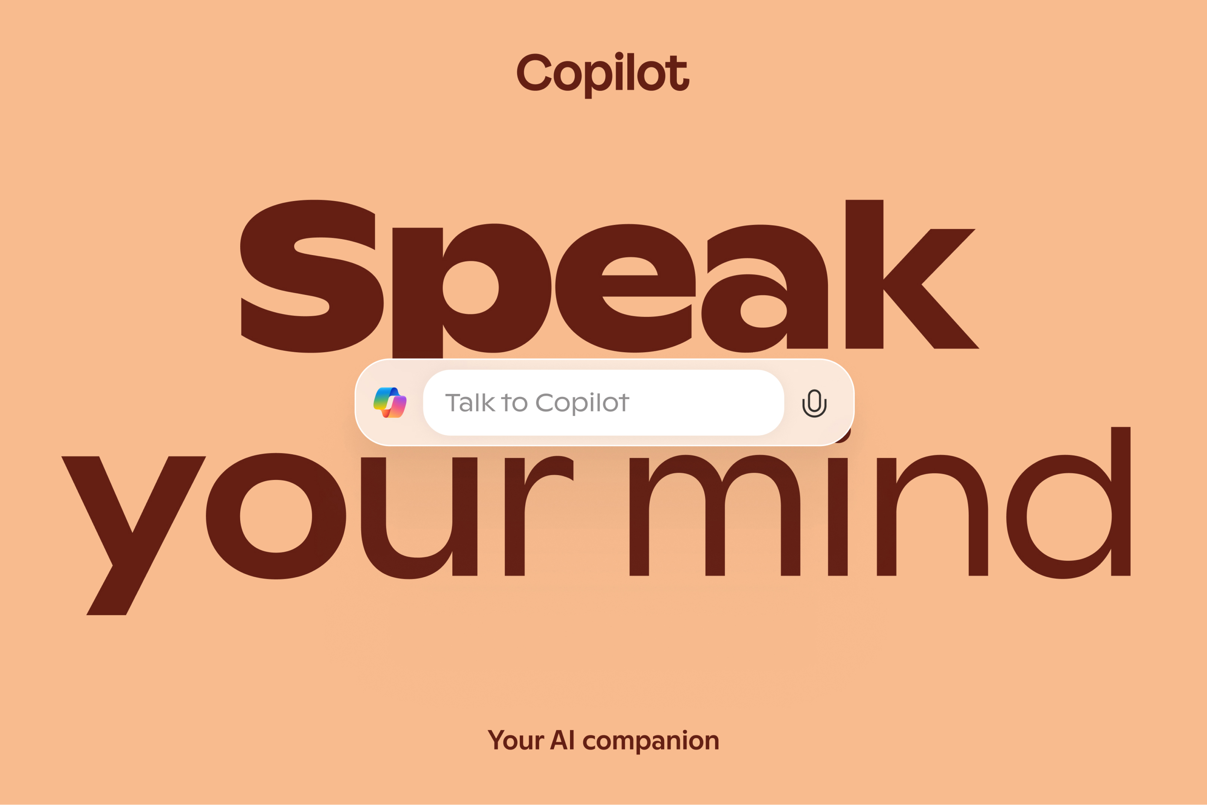  中央に Copilot のメッセージボックスがあるオレンジ色の「思ったことを話してください」のバナー