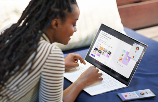 A person using their computer chatting with another party