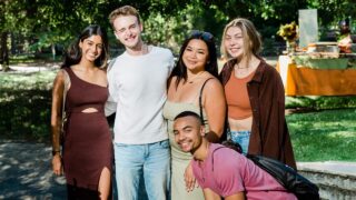Students posing for a photo on campus