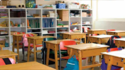 Classroom with desks and chairs.