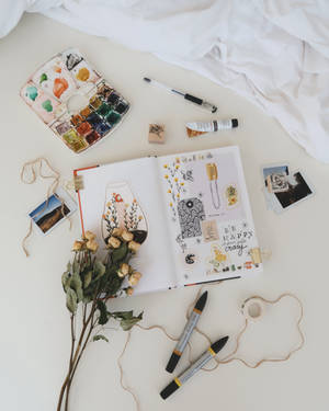 flatlay photography of stuffs on white surface — Gold Wallpapers