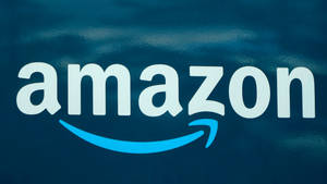 Logo Amazon avec flèche sourire sur fond bleu foncé texturé. — Amazon Fonds d'écran
