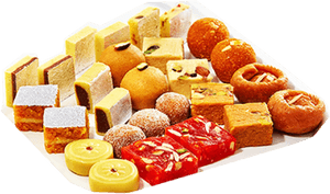 Platter of assorted Indian sweets including cubes balls and layered treats. — Food PNG