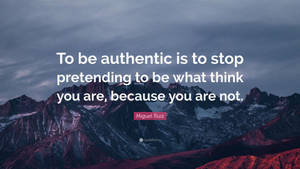 Mountain range with quote by Miguel Ruiz about authenticity. — Authentic Wallpaper