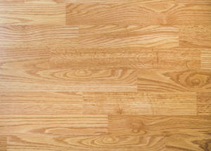 Light oak hardwood floor with natural grain patterns. — Authentic Wallpaper