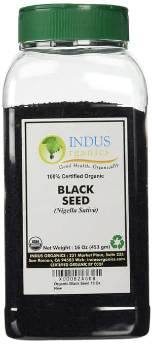 A jar of organic black seed with green lid and label. — OnePlus 11 Wallpaper