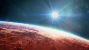 Ein roter fremder Planet mit glühender Atmosphäre unter einem hellen Stern im Weltraum. — Planet Wallpaper