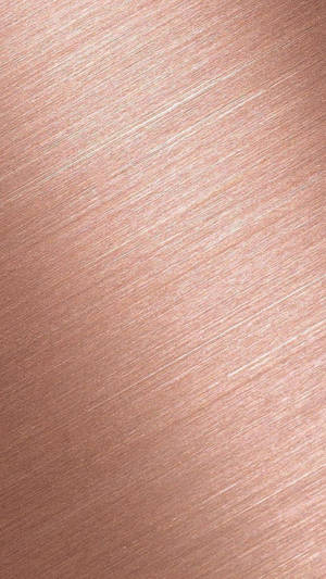 Geborstelde roségoud metaaltextuur met diagonale lichtreflecties. — 9:16 Achtergronden