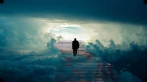 A person walks up a glowing staircase through clouds toward bright light. — Death Wallpaper