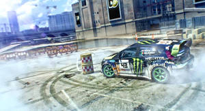 Rally car drifting around a barrel on a wet urban track with smoke and tire marks. — Showdown Wallpaper