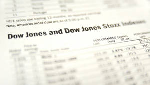 Document financier affichant les statistiques de performance du Dow Jones et du Stoxx Index. — Dow Jones Fonds d'écran