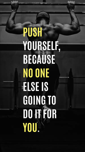 Muscular man doing pull-ups with motivational quote overlaid. — Gym Wallpaper