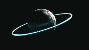 Planet with glowing cyan ring floating in dark space — Planet Wallpaper