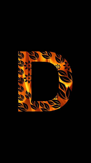 Ein stilisierter Buchstabe D mit Blattmotiven und feurigem orangefarbenem Glühen auf schwarzem Hintergrund. — D Wallpaper