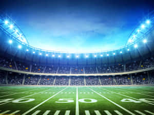 A brightly lit football stadium filled with spectators under twilight sky. — Local Wallpaper