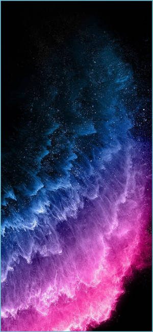 Colorful cosmic nebula with blue and pink clouds against a starry black background. — iPhone 13 Pro Max Wallpaper