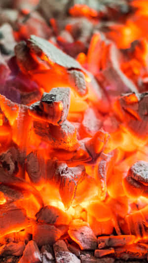 Glowing embers radiating intense heat with sharp textures. — iPhone 7 Plus Wallpaper