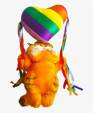 Plush Garfield holding a rainbow heart balloon with ribbons. — Kidcore Wallpaper
