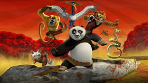 Panda Po and his Furious Five team in mid-air martial arts pose on a rocky cliff. — Hero Wallpaper