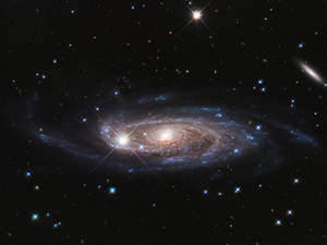 Uma galáxia espiral com estrelas brilhantes e braços brilhantes no espaço profundo. — Universo Papéis de Parede