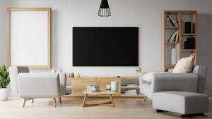 Minimalistisk stue med grå møbler, trædetaljer og stort tv. — Design Wallpapers