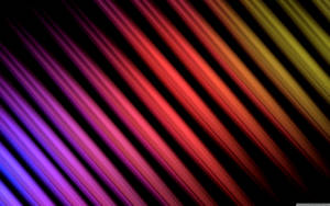 Diagonal rainbow light streaks on black background — Blue Wallpaper