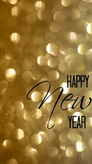 Happy New Year text in black script over golden sparkly background. — Holiday Wallpaper