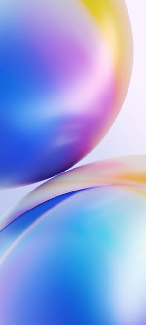 To overlappende farverige gradientkugler i en minimalistisk digital kunststil. — OnePlus Wallpapers