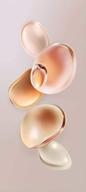 Zwevende gouden doorschijnende bollen met gladde gradiënten en metalen accenten. — Pixel 9a Achtergronden