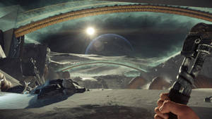 Hand holding wrench inside spacecraft cockpit viewing alien snowy planet with glowing sun. — Prey Wallpaper