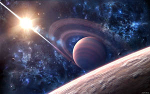A glowing star shines near a ringed planet and distant celestial bodies in a starry nebula. — Saturn Wallpaper
