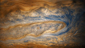 Jupiters wervelende oranje en blauwe wolkenbanden in de ruimte — Jupiter Achtergronden