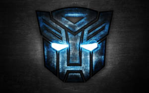 Logotipo azul brillante de Autobot sobre pared oscura texturizada — Logo Fondos de pantalla