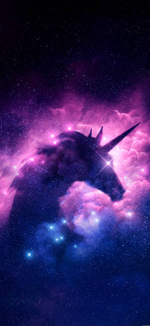 A unicorn silhouette in a vibrant cosmic nebula with stars and glowing clouds. — Unicorn Wallpaper