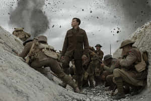 Soldiers in World War I uniforms in a muddy trench during an explosion. — War Wallpaper