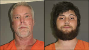 Two men in orange jumpsuits in a prison mugshot. — Fight Wallpaper